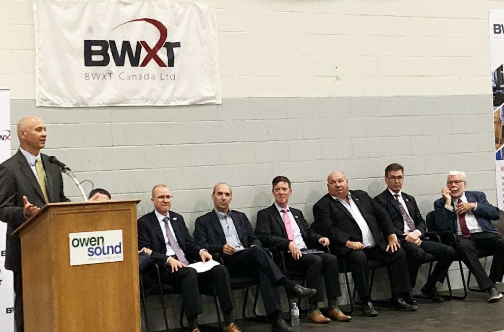 Mike Rencheck with dignitaries at BWXT announcement