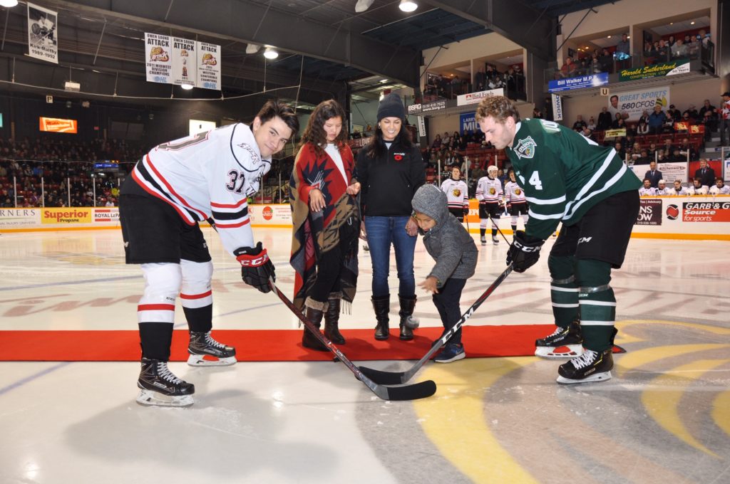 Saugeen Ojibway Nation youth drop puck at Owen Sound Attack game
