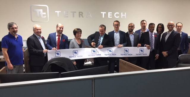 Dignitaries cut ribbon at Tetra Tech office
