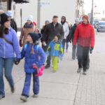 People walk in Coldest Night of the Year event in downtown Port Elgin.