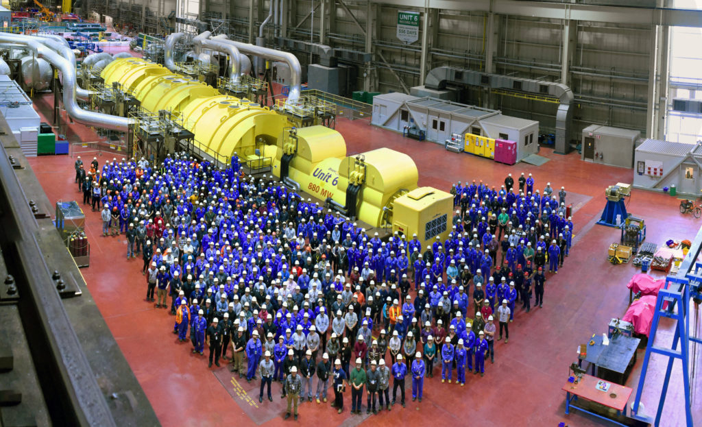 Employees at Unit 6 turbine hall