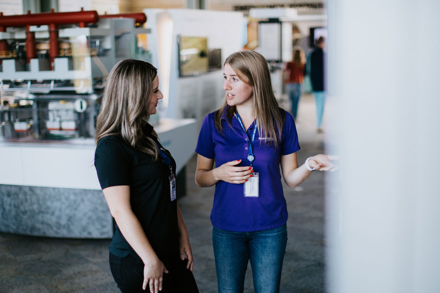 student giving a tour of facility