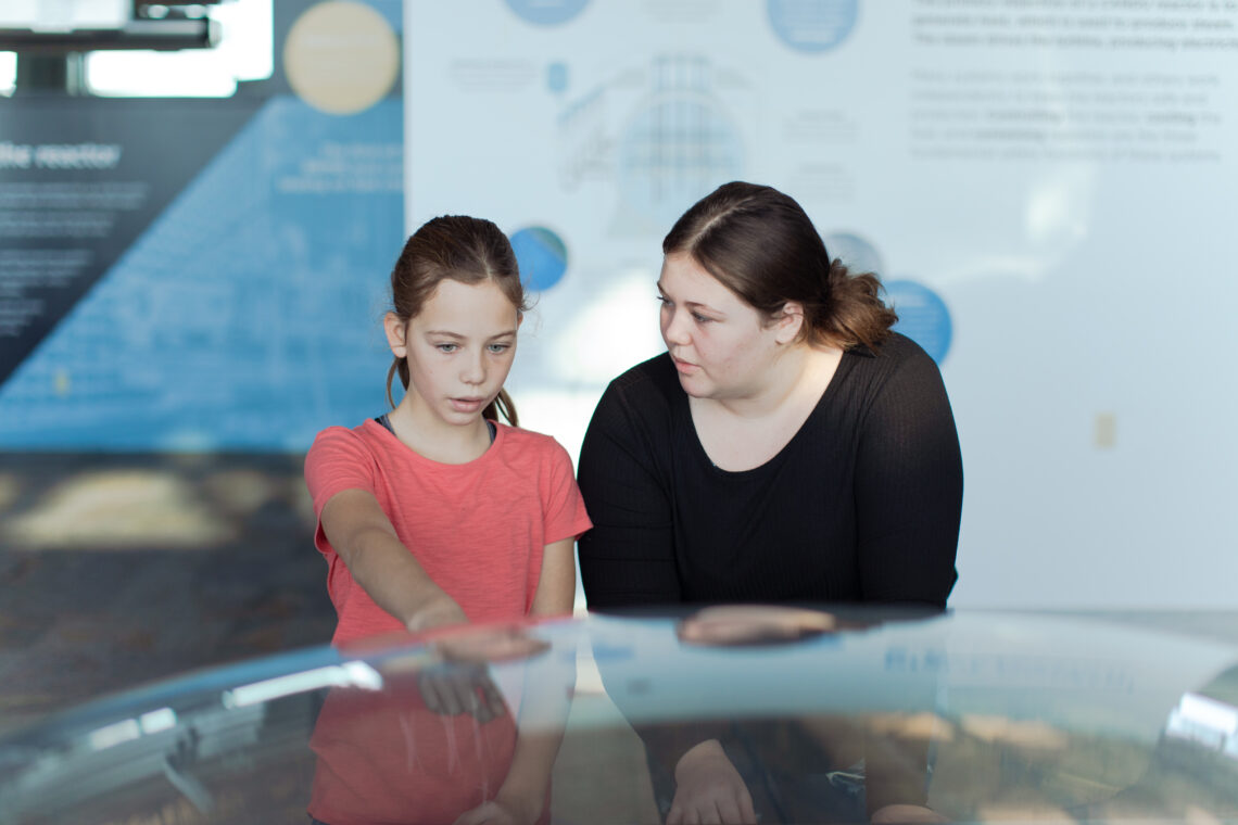 Girls discuss model of Bruce Power site