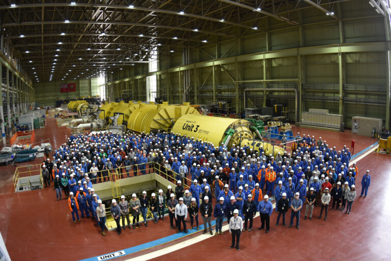 Workers gather in the Unit 3 turbine hall