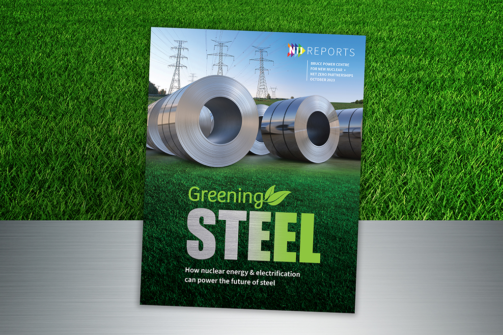 A report cover sitting on simulated grass and steel. The report has the NII logo and text that reads "Reports. Bruce Power Centre for New Nuclear + Net Zero Partnerships October 2023." The title of the report is "Greening Steel: How nuclear energy & electrification can power the future of steel."
