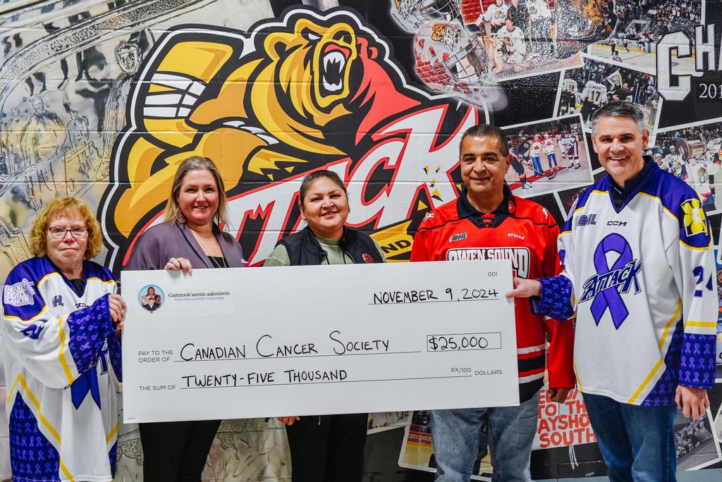 Bruce Power and the Saugeen Ojibway Nation (SON), through their Gamzook’aamin aakoziwin medical isotope partnership, donated $25,000 to the Canadian Cancer Society’s Hockey Fights Cancer fundraiser at the Nov. 9 Owen Sound Attack game. Pictured, from left, are: Brenda Hawthorne, volunteer for Canadian Cancer Society; Allison Taylor-Misener, Cops for Cancer Specialist at Canadian Cancer Society; Carlene Keeshig, Councillor, Chippewas of Nawash Unceded First Nation; Lester Anoquot, Councillor, Saugeen First Nation; and James Scongack, Bruce Power’s Chief Operating Officer and Executive Vice-President.