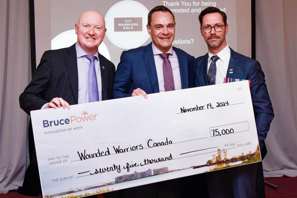 Bruce Power President and Chief Executive Officer, Eric Chassard, centre, presents a cheque for $75,000 to Wounded Warriors Canada on behalf of the company’s supplier partners during a gala Nov. 14. Accepting the donation is Scott Maxwell, Chief Executive Officer, Wounded Warriors Canada, left, and guest speaker David Quick, who is one of only 20 people to have been awarded the Star of Military Valour, Canada’s second highest decoration for valour. Quick was injured by a roadside bomb in Afghanistan in 2007 while commanding in combat.