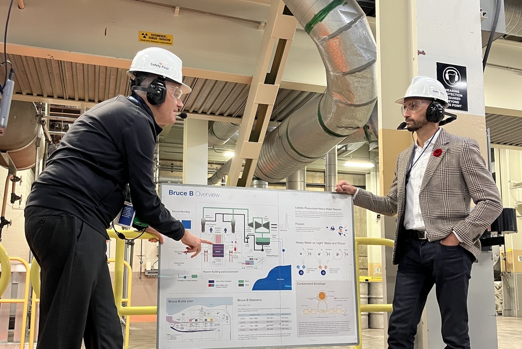 Ontario's Minister of Energy and Electrification, Stephen Lecce, right, tours Bruce B with Bruce Power's Chief Operating Officer and Executive Vice-President James Scongack. Lecce visited the site in November to announce a new hot cell facility.