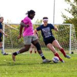 Bruce Power Challengers Cup soccer tournament players on the field.