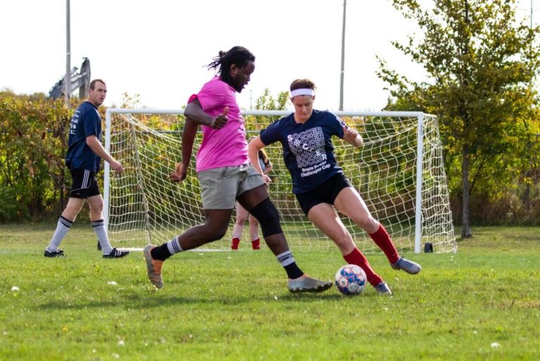 Bruce Power Challengers Cup soccer tournament players on the field.