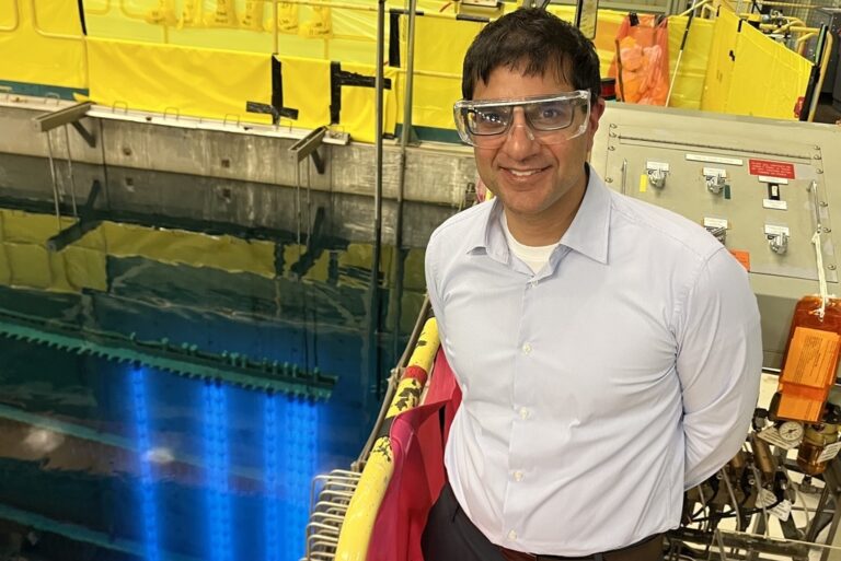 Dr. Arjun Sahgal, Chief of Radiation Oncology at Sunnybrook Health Sciences Centre, who uses HSA cobalt to treat cancer patients with gamma knife technology, recently visited Bruce Power to tour its facilities and got a first-hand look at the cobalt-60 harvested from Unit 5. The cobalt adjuster rods sit shielded in the fuel bay, glowing blue due to the Cherenkov effect, which happens when electrically charged particles travel faster than light in a clear medium such as water.