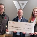 Bruce Power’s John Peevers, centre, presents a donation to Matthew Shute and Sarah Cowley of the YMCA of Owen Sound Grey Bruce in support of the Homelessness Response Program.