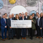 Bruce Power and dignitaries present a cheque for $1-million to the Well Community Collective.