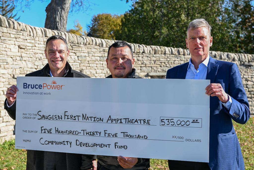 Kinectrics recently donated $500,000 to the Saugeen Amphitheatre restoration project through Bruce Power’s Saugeen Ojibway Nation (SON) Community Development Fund. Presenting the cheque to Saugeen First Nation Chief Conrad Ritchie, centre, are Bruce Power President and Chief Executive Officer Eric Chassard, left, and David Harris, President and CEO, Kinectrics.