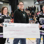 Bruce Power and the Saugeen Ojibway Nation (SON), through their Gamzook’aamin aakoziwin medical isotope partnership, donated $25,000 to the Canadian Cancer Society’s Hockey Fights Cancer fundraiser at the Nov. 8 Owen Sound Attack game. Pictured, from left, are: Allison Taylor-Misener, Cops for Cancer Specialist at Canadian Cancer Society; Michael Chegahno, Director of Gamzook’aamin aakoziwin, and Chad McLean of Bruce Power.