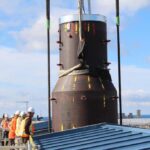 A massive steam generator is lifted into the Bruce A generating station during the Unit 3 Major Component Replacement outage.