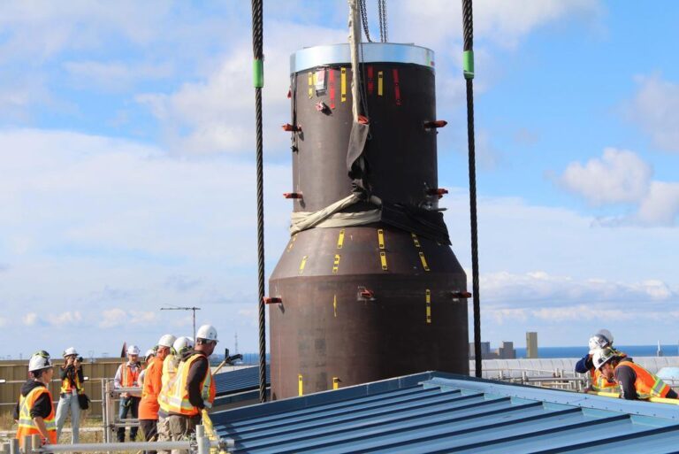 A massive steam generator is lifted into the Bruce A generating station during the Unit 3 Major Component Replacement outage.