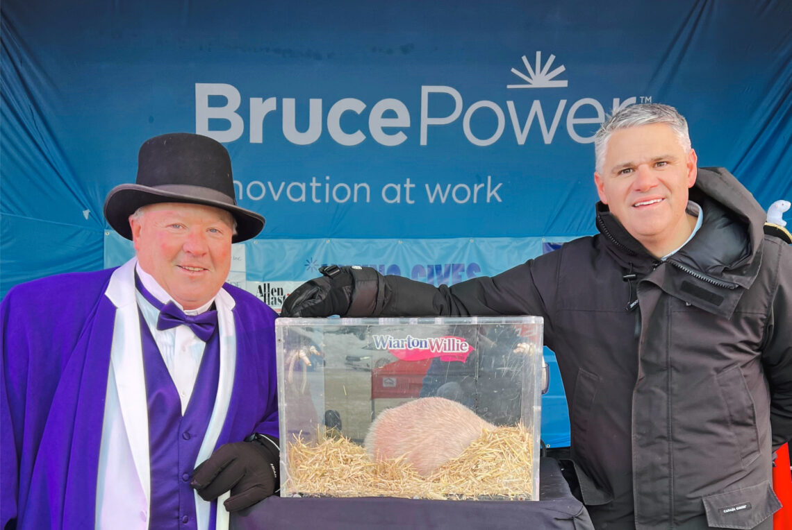 Town of South Bruce Peninsula Mayor Jay Kirkland, left, and Bruce Power's James Scongack joined the star of the show, Wiarton Willie, at the 70th annual Wiarton Willie Festival.